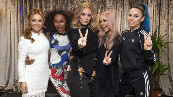 Adele Gives The Victory Sign And Poses with the Spice Girls