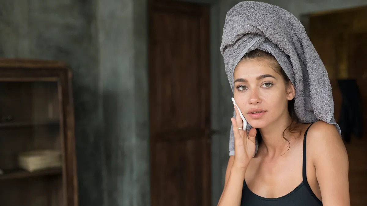 Woman Using Cotton Pad