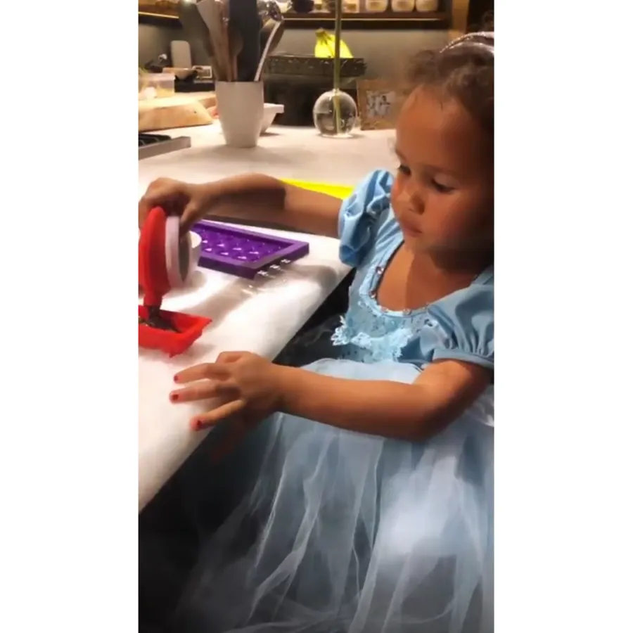 Chrissy-Teigen-John-Legend-Daughter-Luna-Princess-Dress