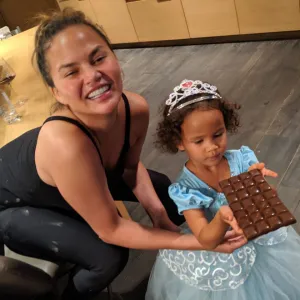 Chrissy Teigen, John Legend Make Chocolates With Daughter Luna