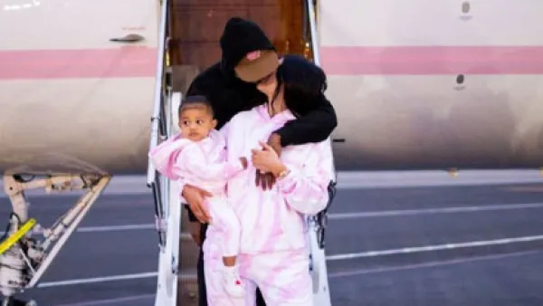 Kylie Jenner Kisses Travis Scott on Steps of Private Plane as She Embarks on Girls’ Trip With Stormi
