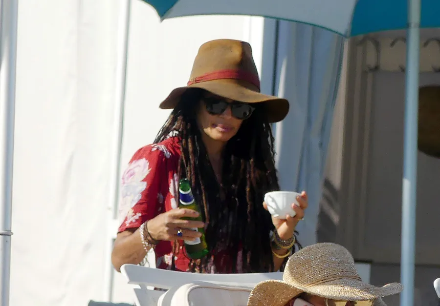 Lisa Bonet Pours A Drink