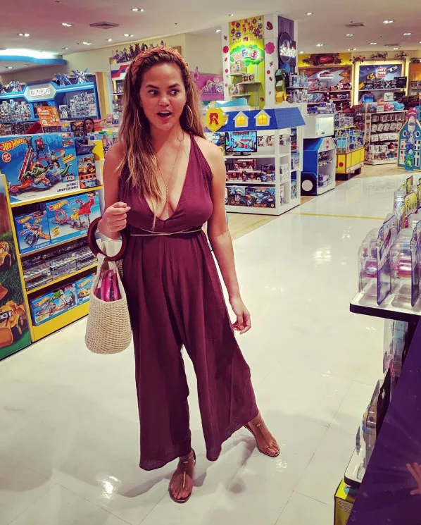 Chrissy Teigen Claps Back At Trolls No Bra