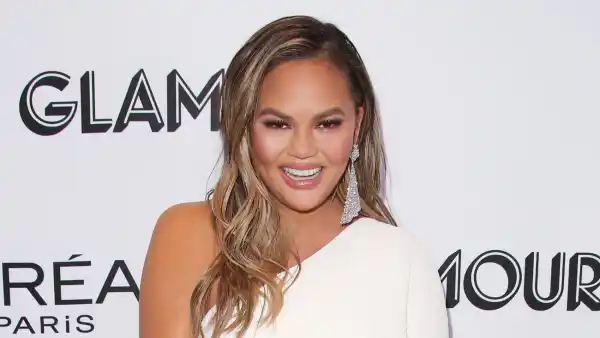 Chrissy Teigen White Dress November 12, 2018