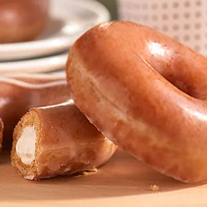 Krispy Kreme Debuts New Pumpkin Spice Doughnut Filled With Cheesecake