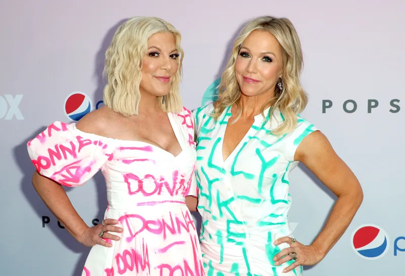 Tori Spelling and Jennie Garth Wearing Clothes With Donna and Kelly Written on Them Say Aaron Spelling Would Be Proud BH90210