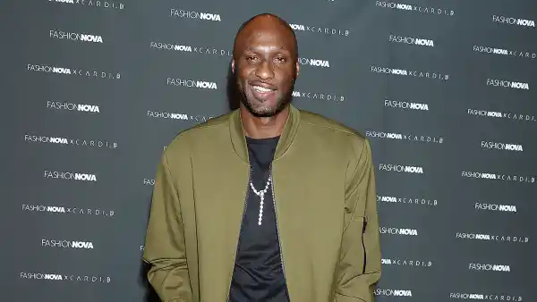 Lamar Odom Green Jacket Rob Kardashian and Kourtney Kardashian Good With His Kids