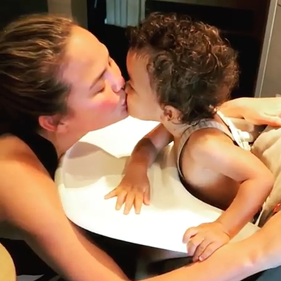Miles Gives Chrissy Teigen Kiss