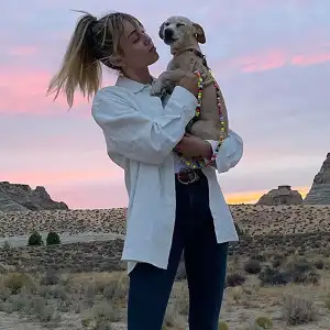 Miley Cyrus Hikes and Gets Massage With Her Dog Bean