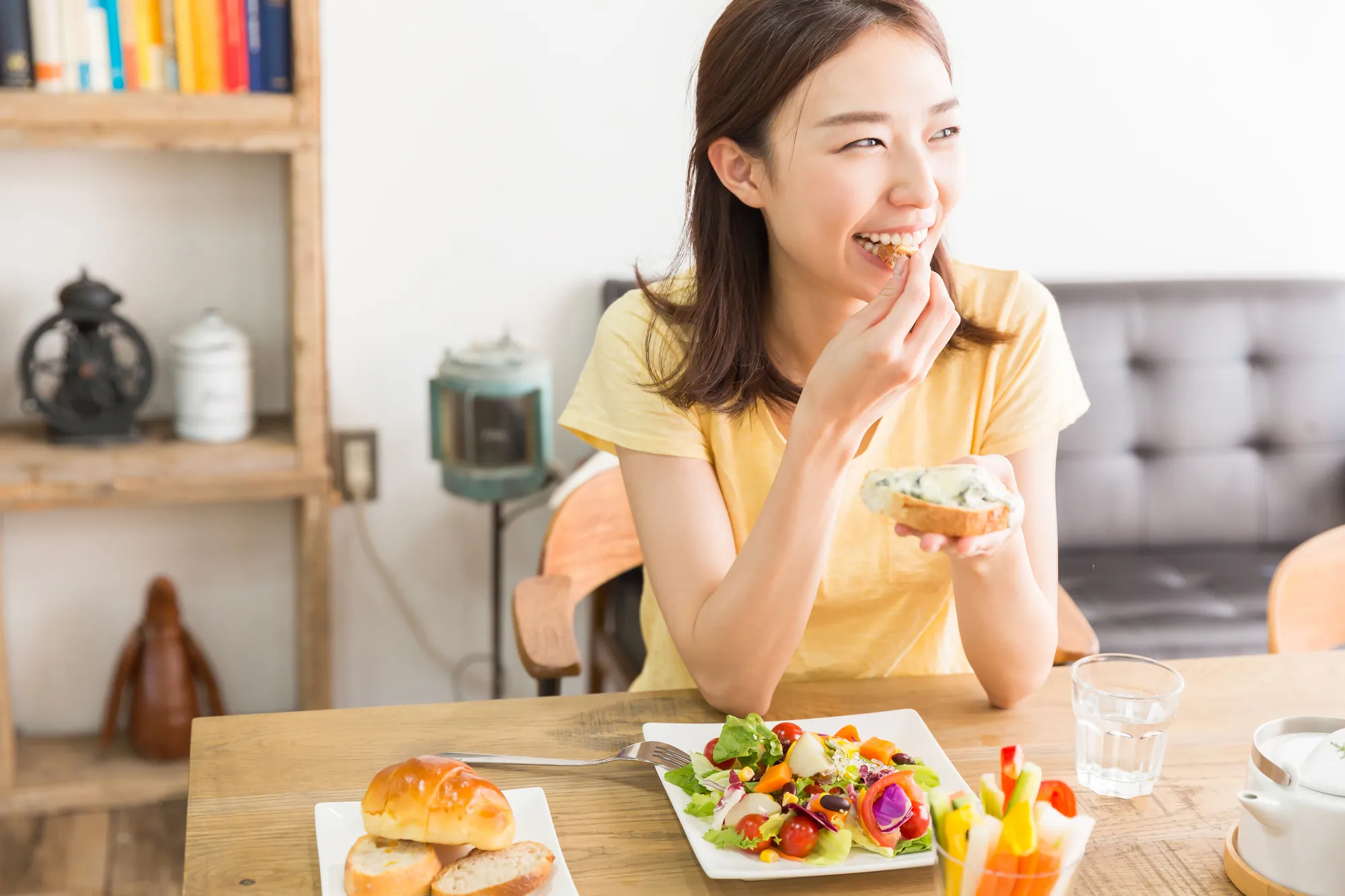 woman eating bread