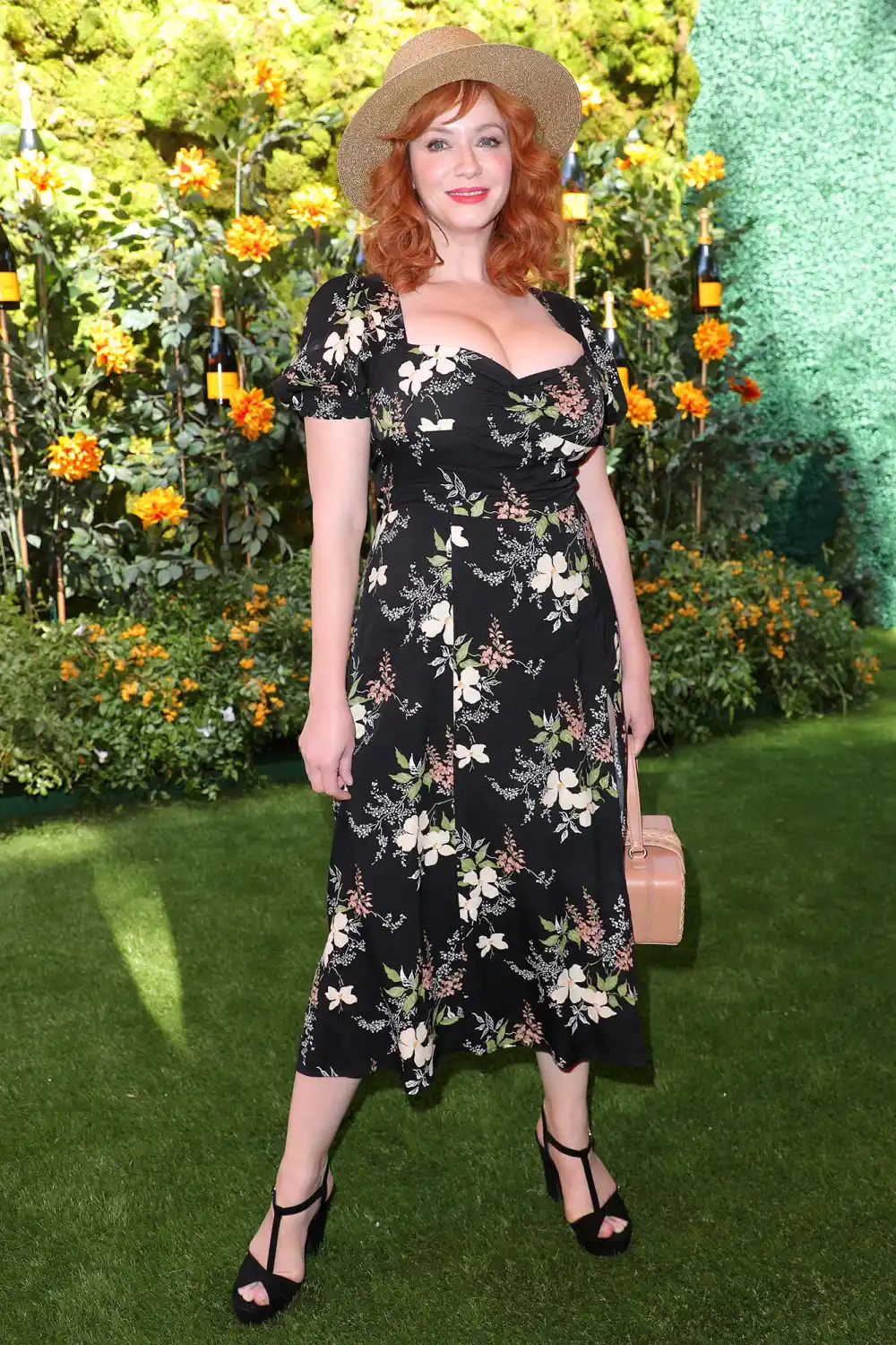Christina Hendricks Veuve Clicquot Polo Classic Wearing Reformation Floral Flower Dress Sun Hat