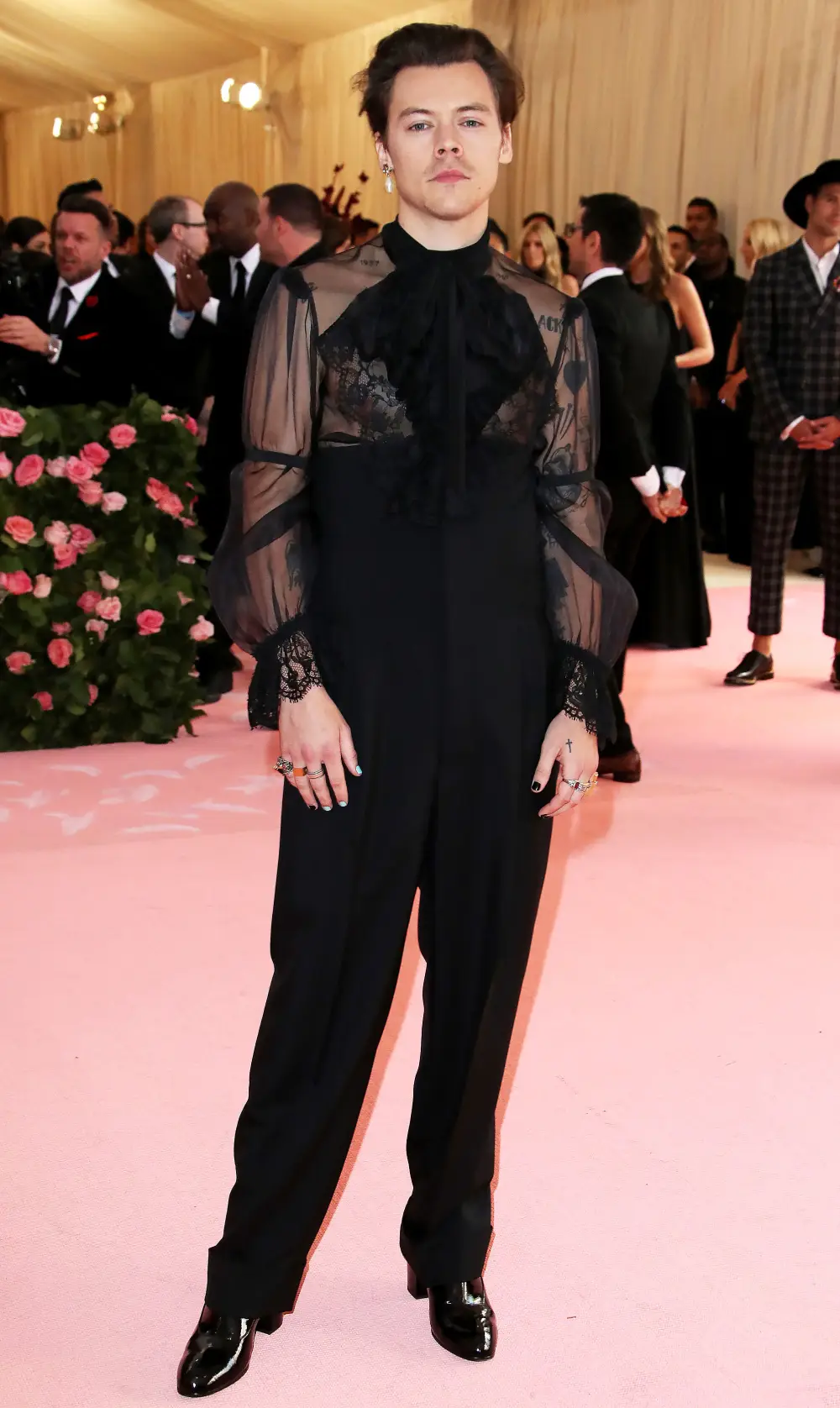 Harry Styles Freezes His Bespoke Outfits