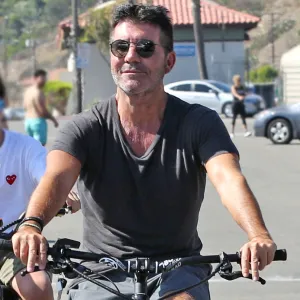 Simon Cowell-Celebrities on Bicycles! See Hollywood’s Pedal Pushers Ride Through the Streets