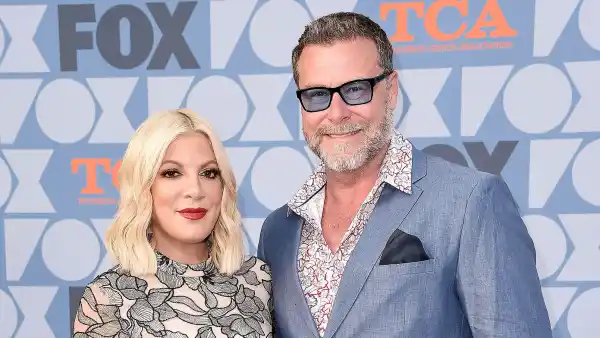Tori Spelling and Dean McDermott Blue jacket Blue Glasses