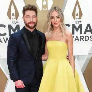 Chris Lane and Lauren Lane 2019 CMA Awards Arrival Red Carpet Yellow Dress