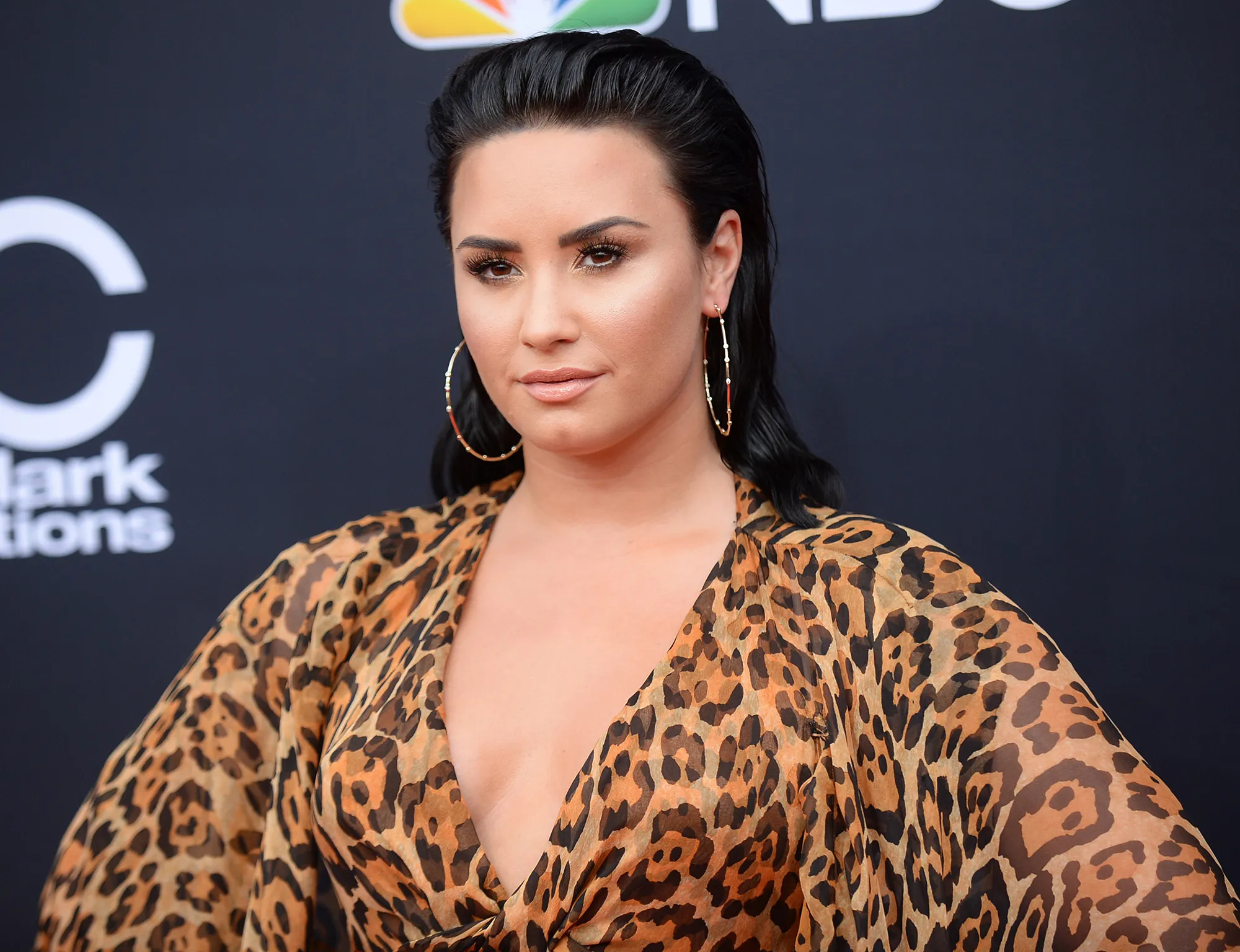 Demi Lovato Cradles Baby Bump for 'Will & Grace'