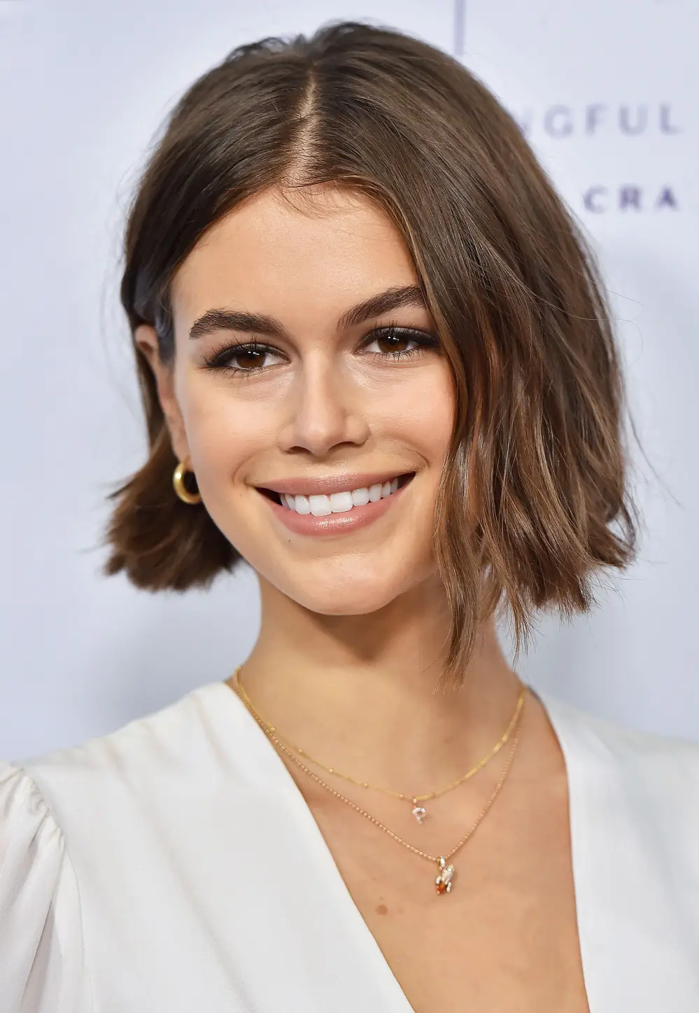 Kaia Gerber Wears "P" Necklace