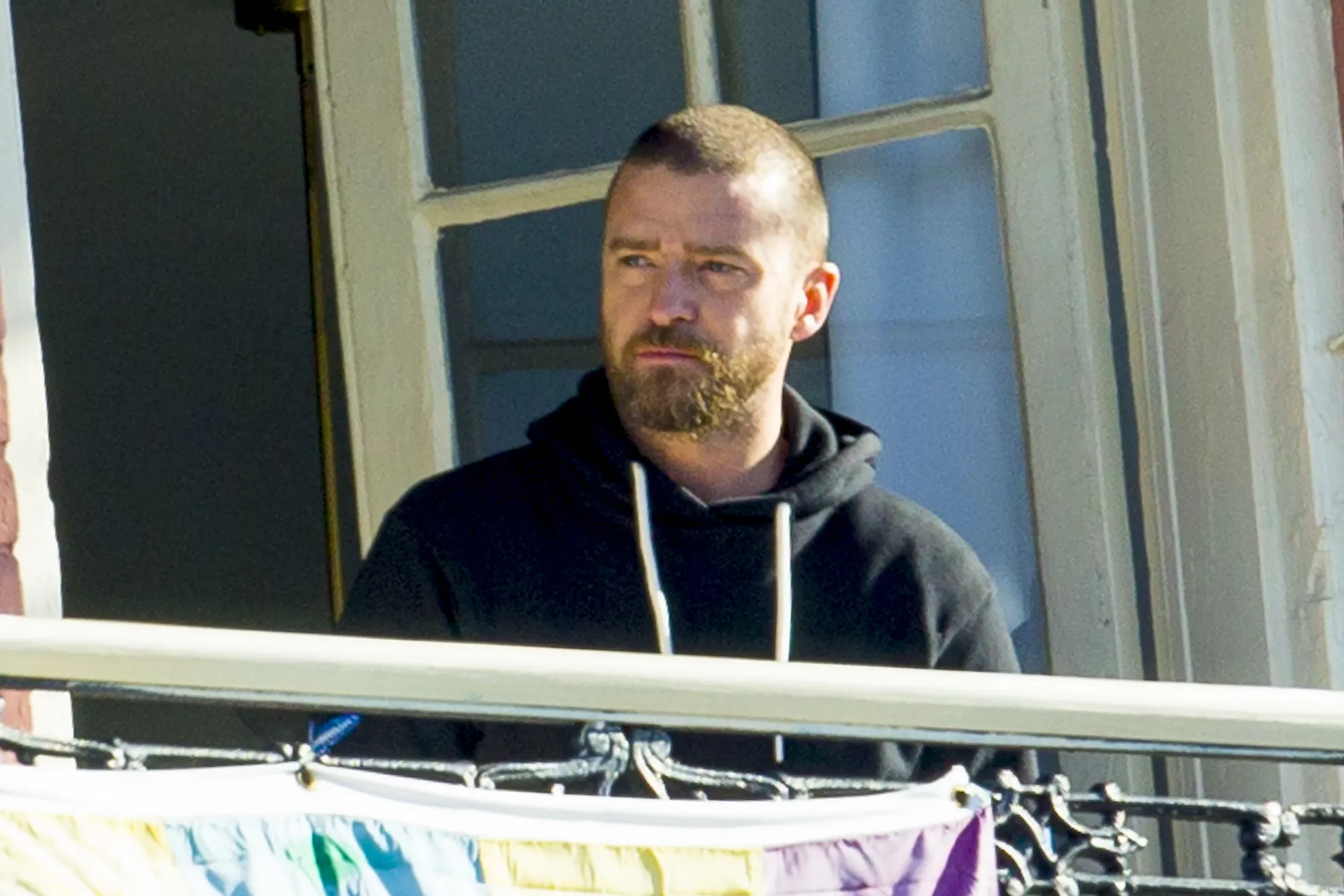 Justin Timberlake Returns to New Orleans Balcony Sans Alisha Wainwright After PDA Scandal