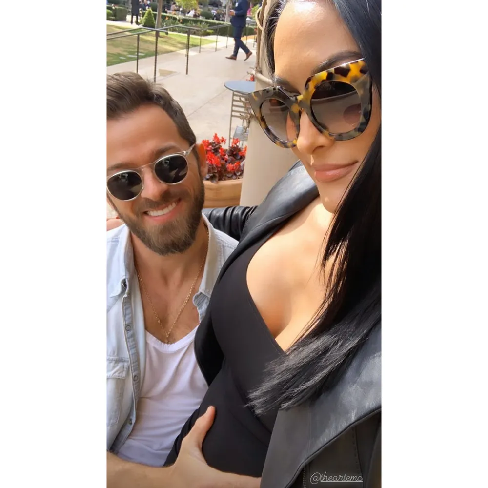 Artem-Chignitsev-Cradles-Pregnant-Nikki-Bella&rsquo;s-Baby-Bump