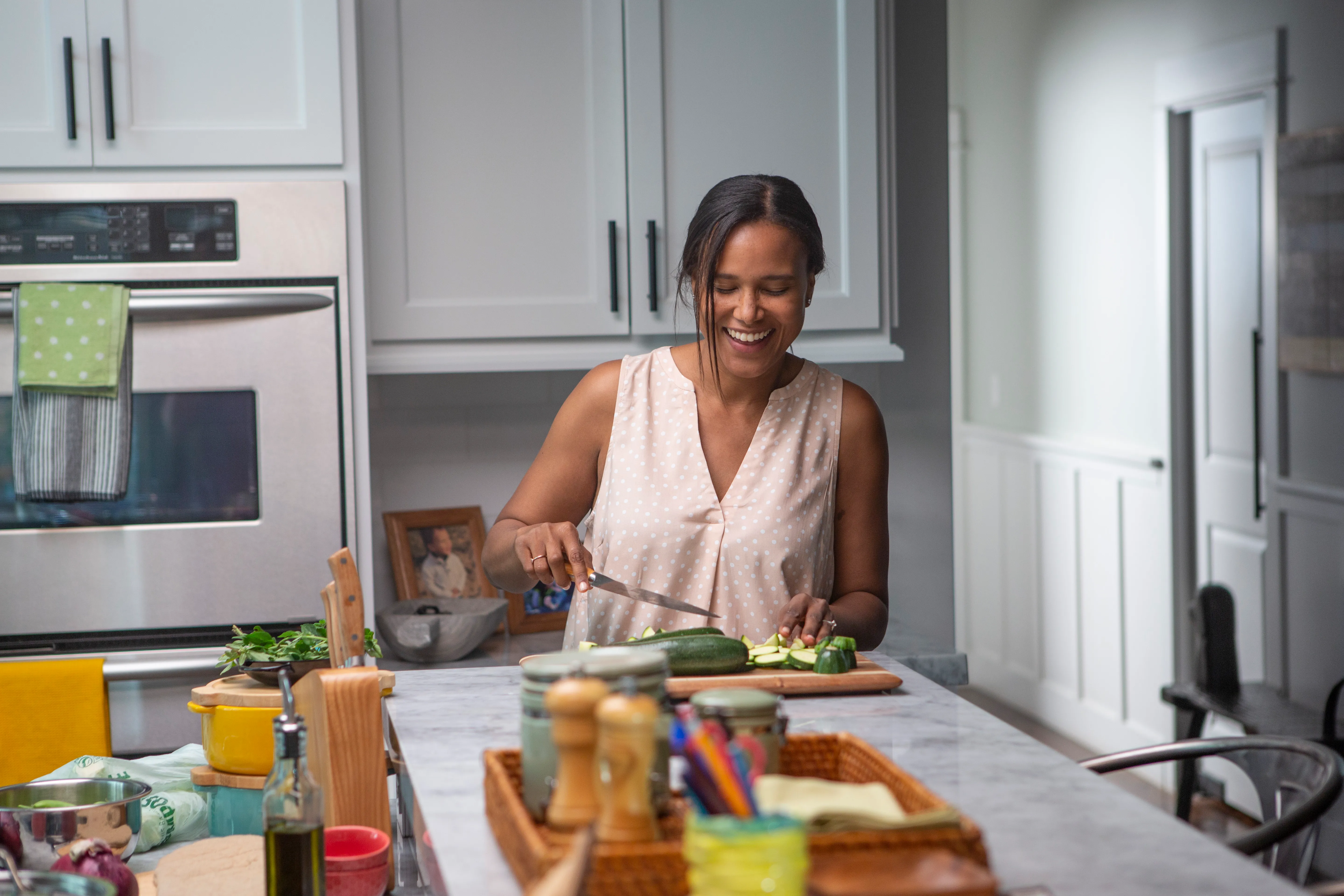 woman preparing food in her kitchen