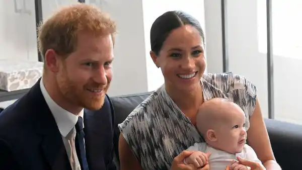 Prince Harry and Meghan Markle Duchess of Sussex Holding Archie