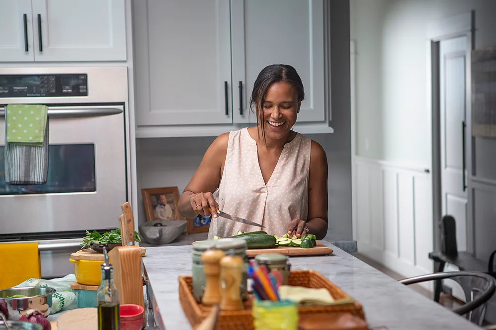 woman-cutting-cucumber
