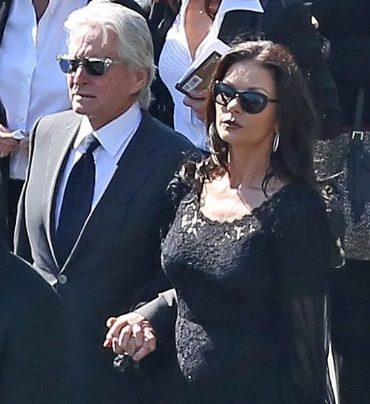 Michael Douglas and Catherine Zeta-Jones at Kirk Douglas funeral in Los Angeles