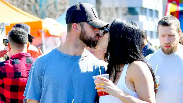 Nikki Bella Kisses Fiance Artem Chigvintsev While Showing Off Baby Bump