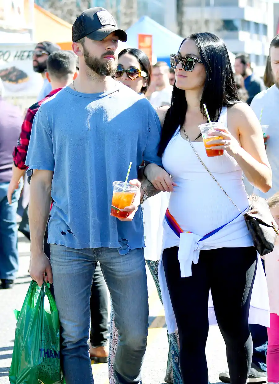 Nikki Bella Kisses Fiance Artem Chigvintsev While Showing Off Baby Bump