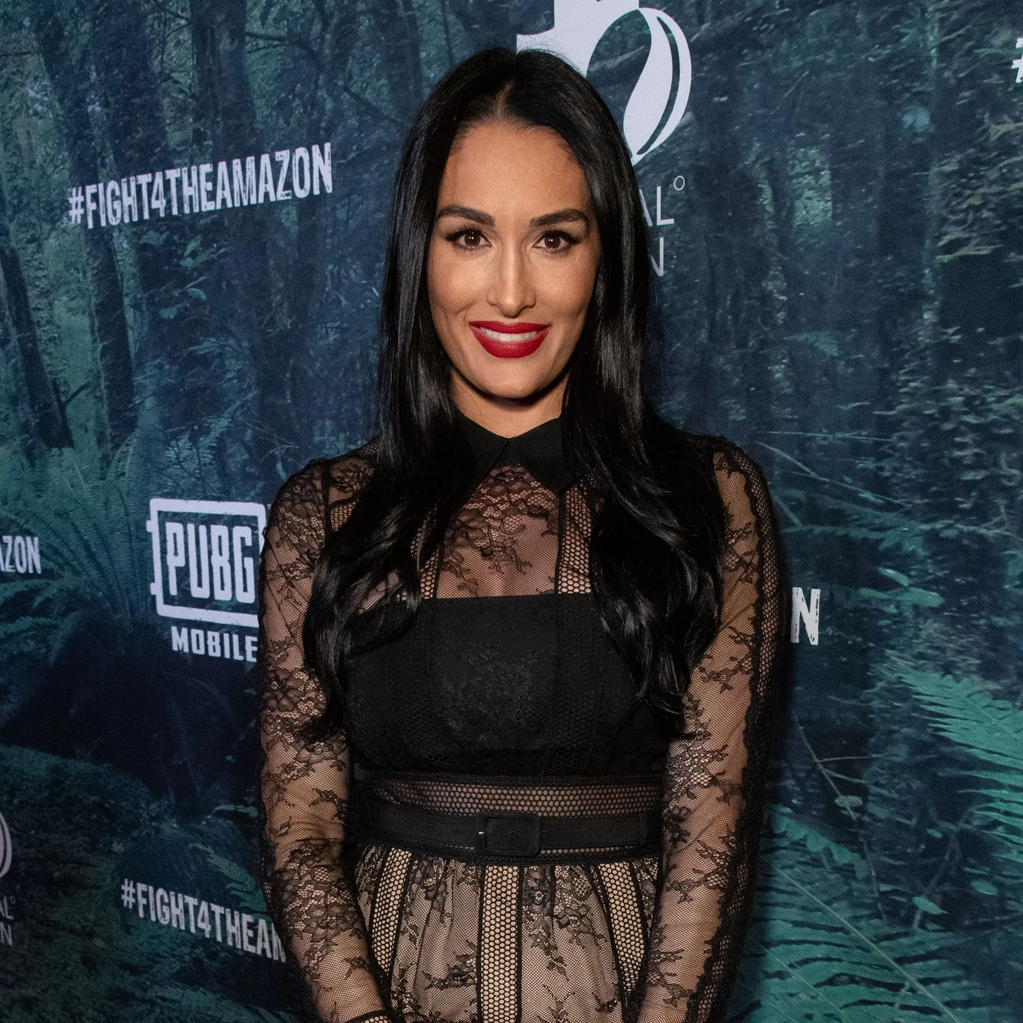 Nikki Bella Shows Off Pregnancy Curves I’m Fitted Black Dress: ‘My Bump Has Gotten So Much Bigger’