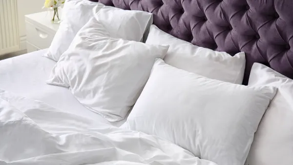 Bed with pillows and comforter