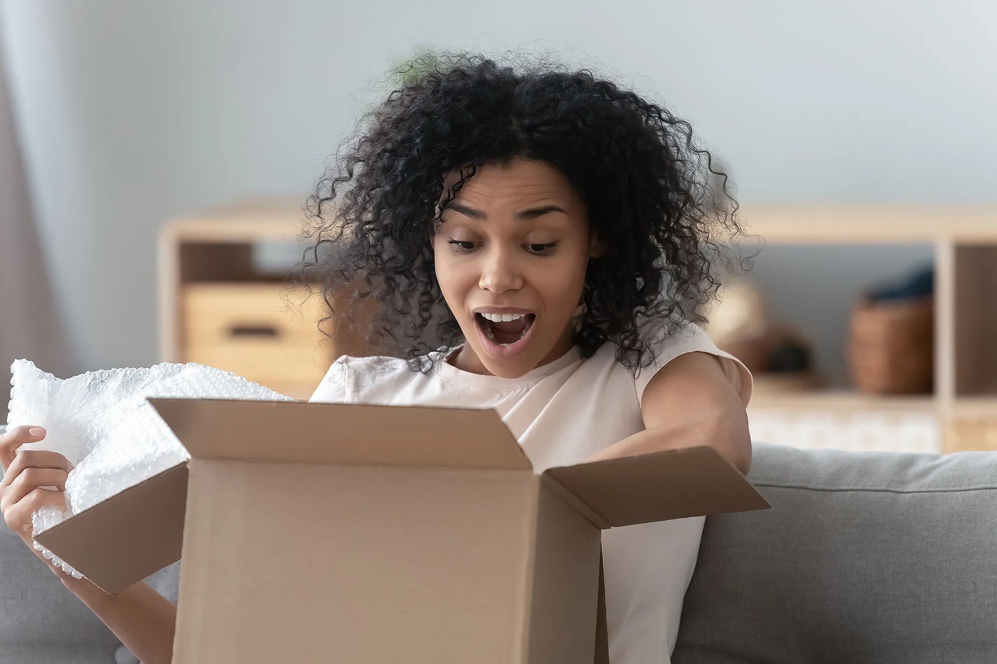 woman-opening-box