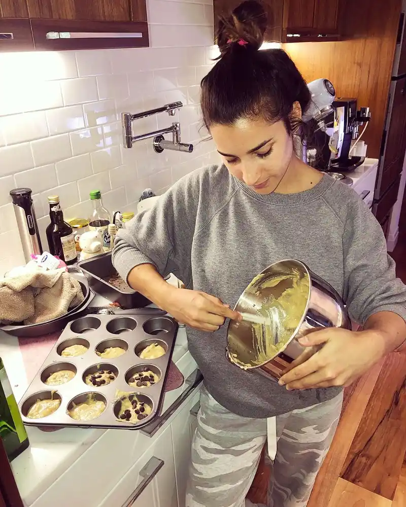 Aly Raisman Making banana bread muffins with chocolate chips