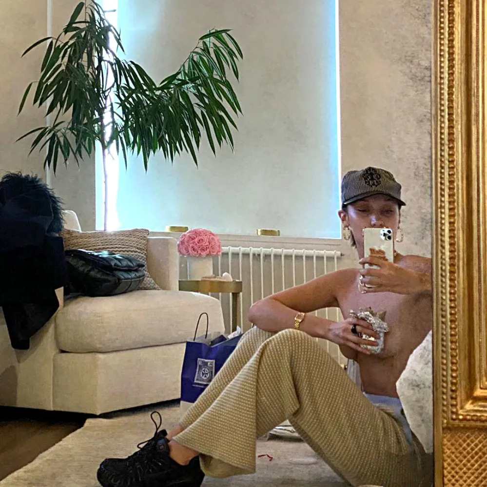 Bella Hadid Poses Topless With Burrito to Urge People to Stay Inside