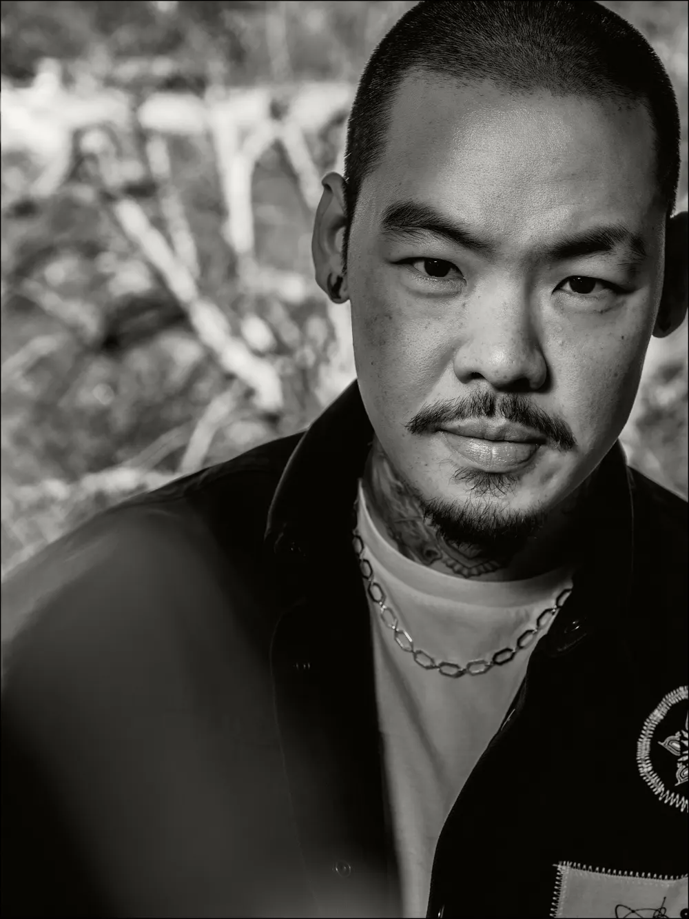 Tattoo Legend Dr. Woo Unveils Part 1 of His Ink-Focused Skincare Collection