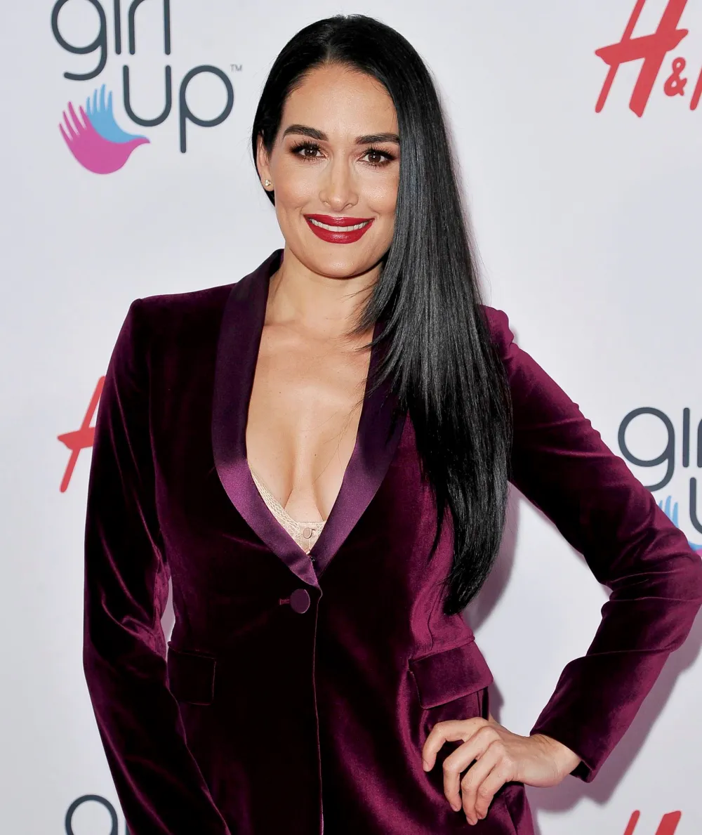 Nikki-Bella-Bares-Baby-Bump-in-Topless-Shot