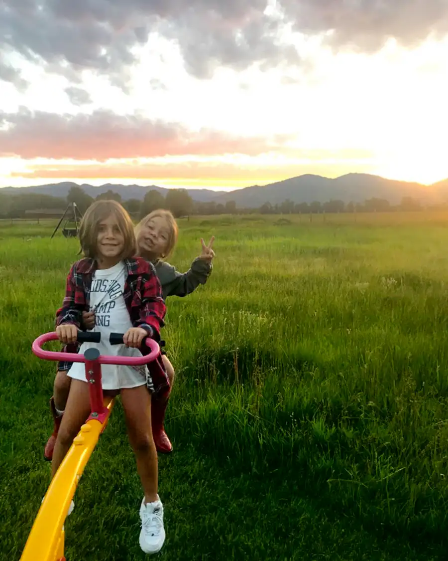 Reign Disick Flashes Peace Sign on Seesaw