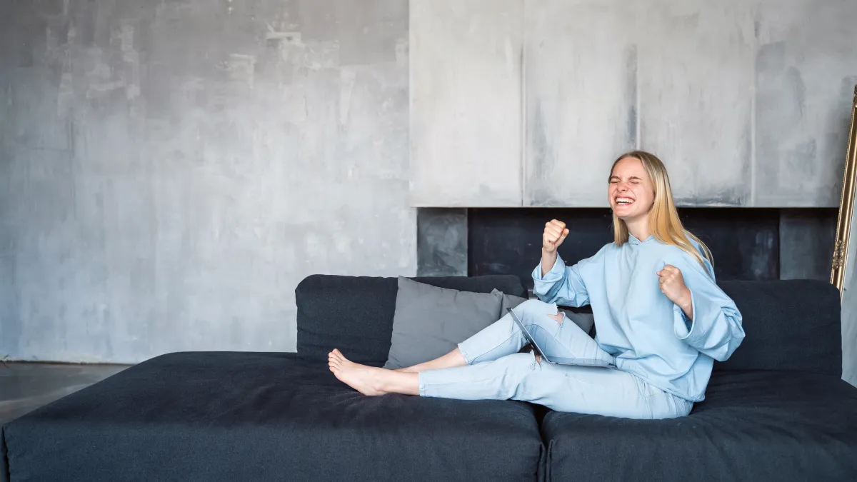 woman lounging on sofa