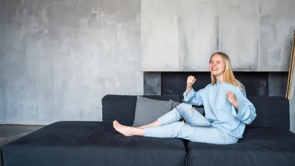 woman lounging on sofa