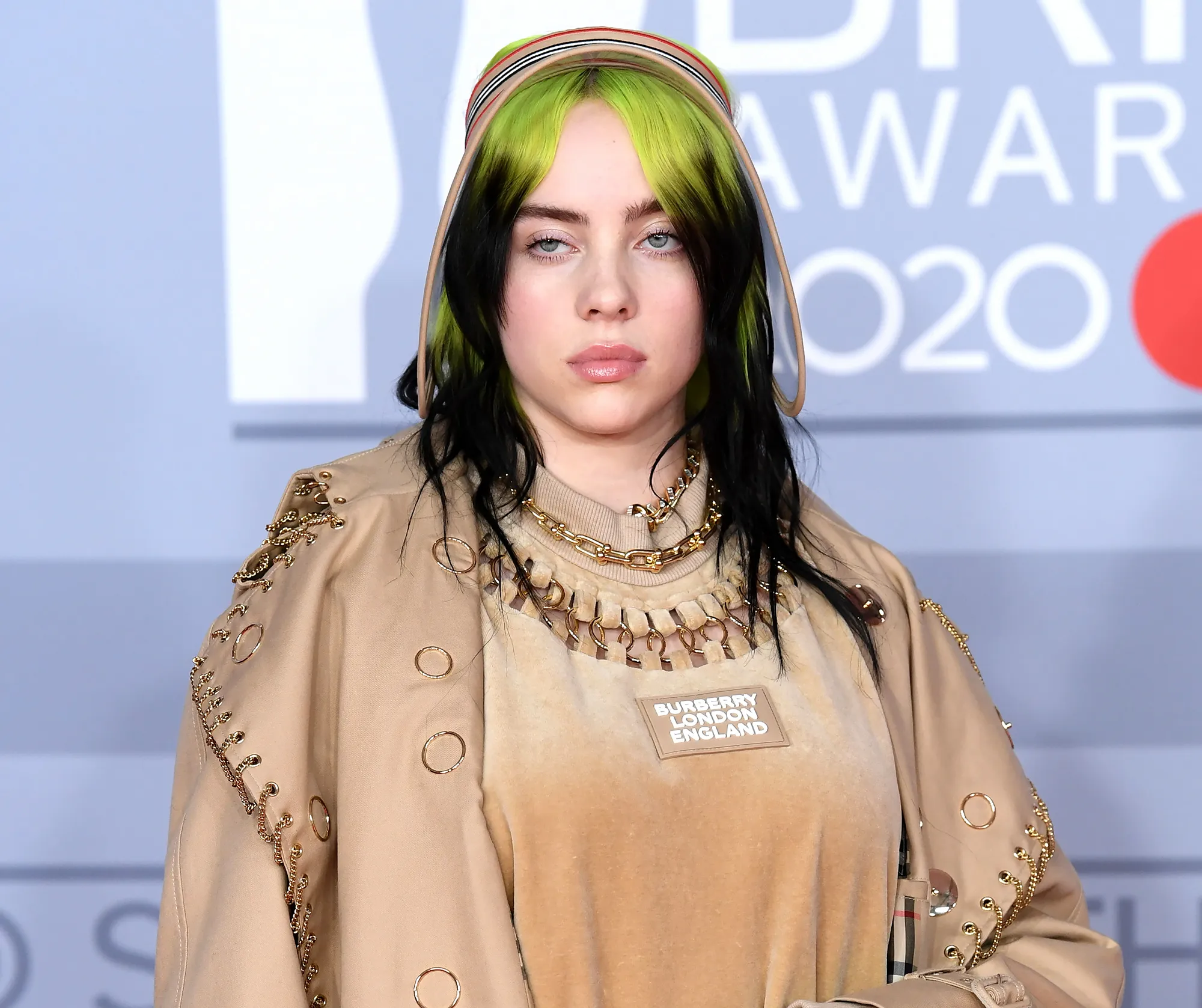 Billie Eilish Hits Back at Critics After Sharing a ‘Tame’ Photo in a Bathing Suit on Vacation: ‘I Can’t Win’