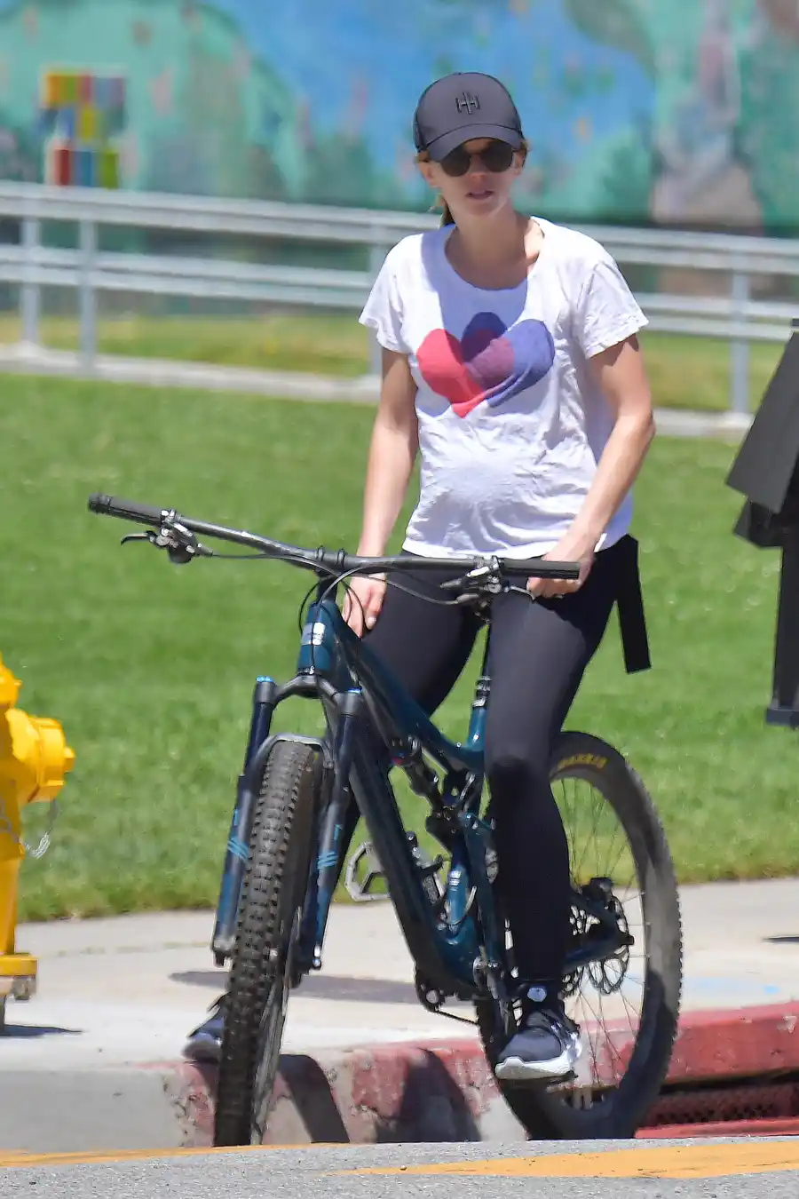 Pregnant Katherine Schwarzenegger Reveals Her Baby Bump on Bike Ride With Chris Pratt