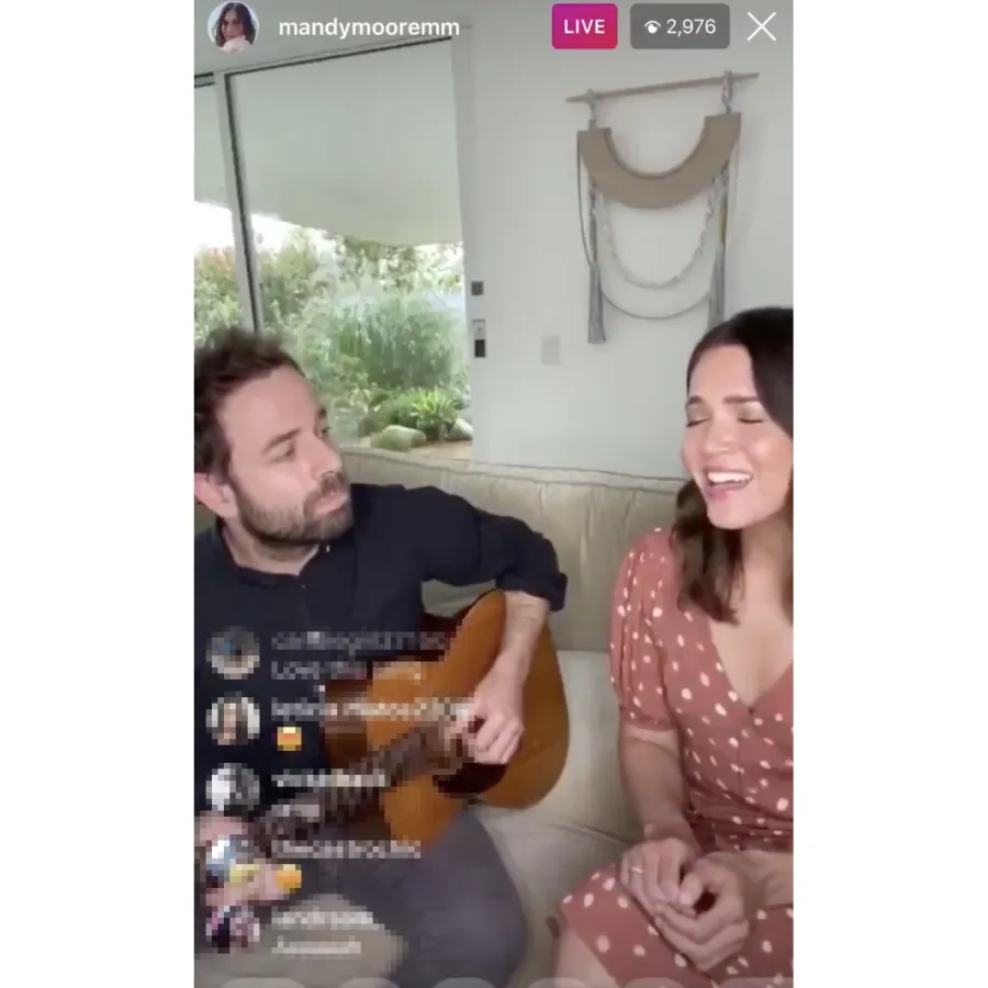 Mandy Moore performing with husband