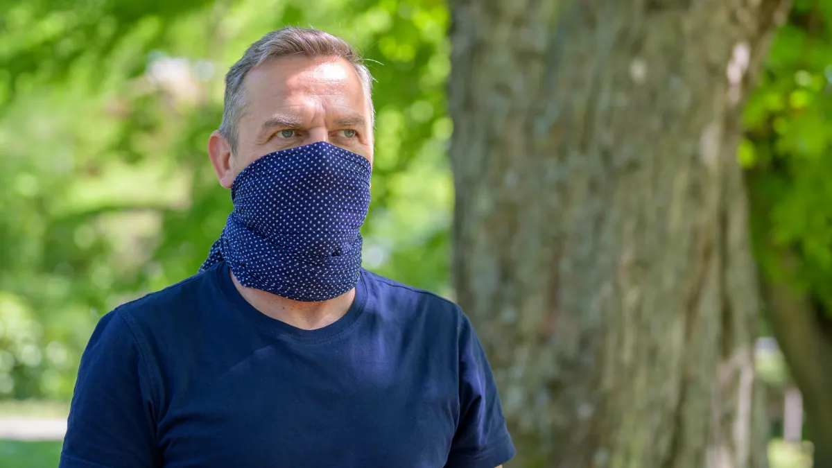 face covering stock photo