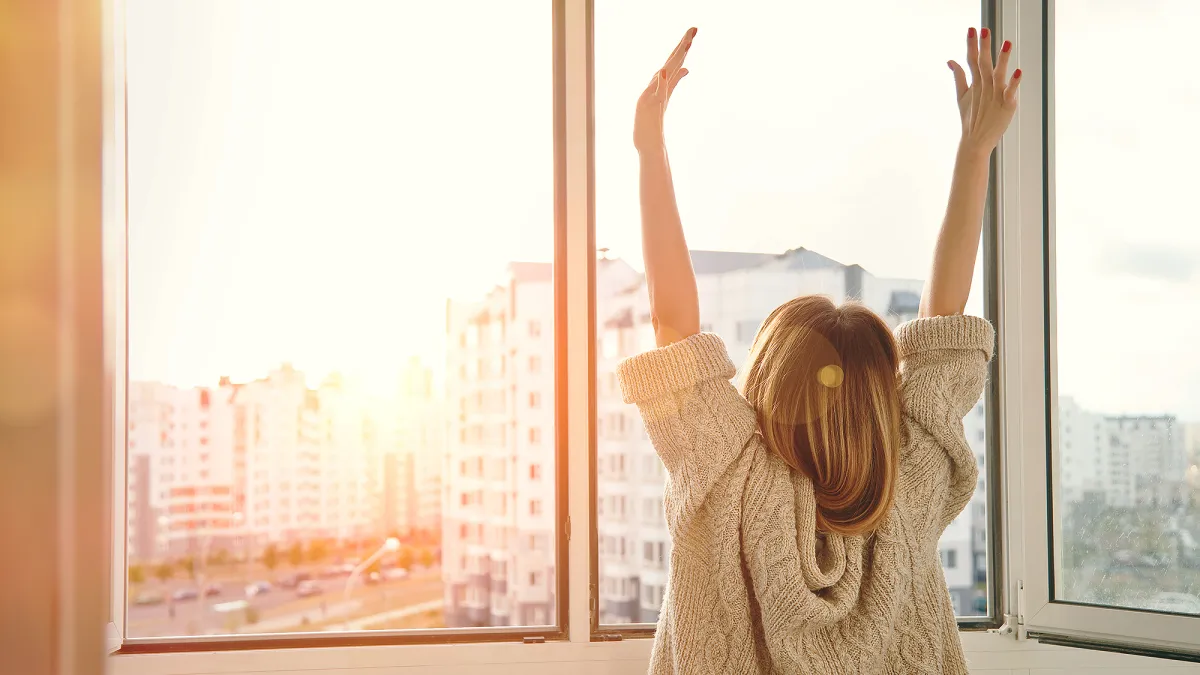 woman-stretching-sunrise-zinc