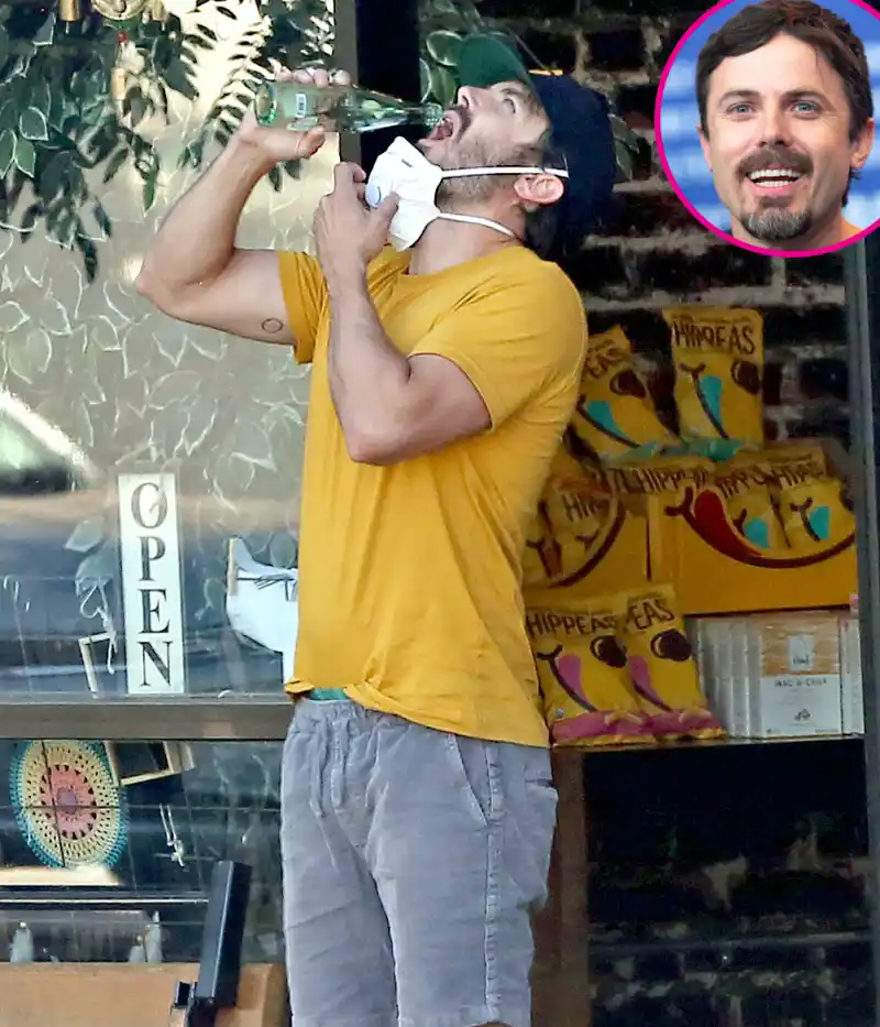 Casey Affleck drinking water