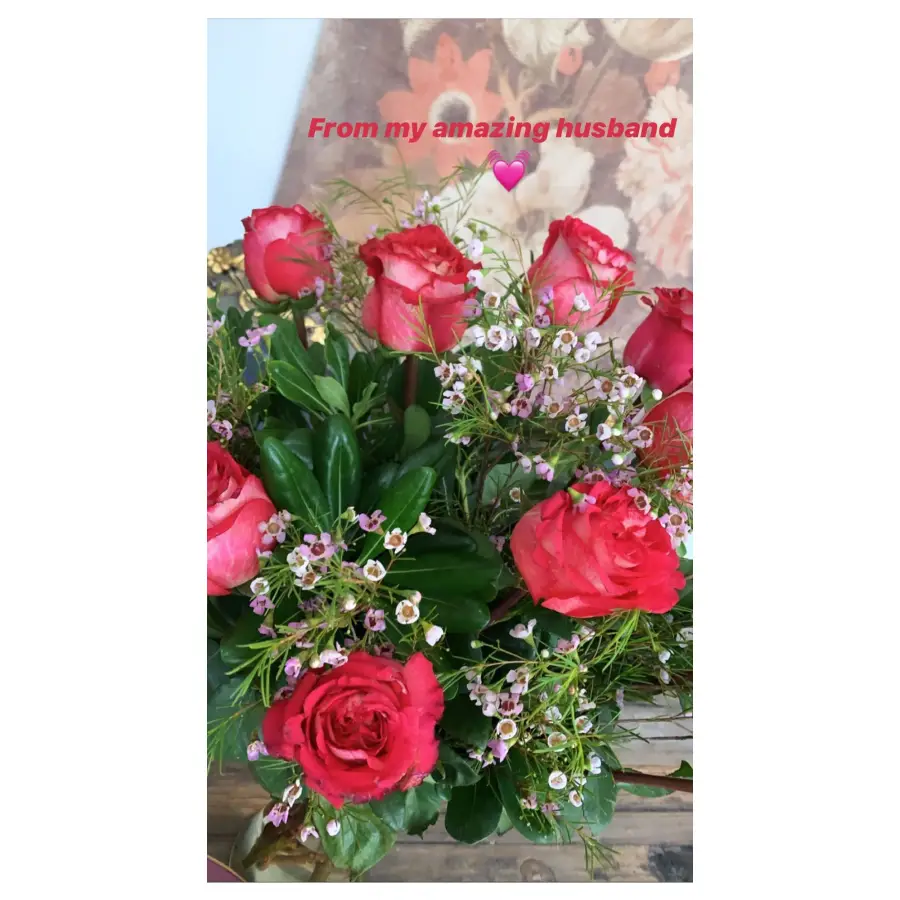 Lea Michele Cradles Baby Bump Mothers Day Flowers