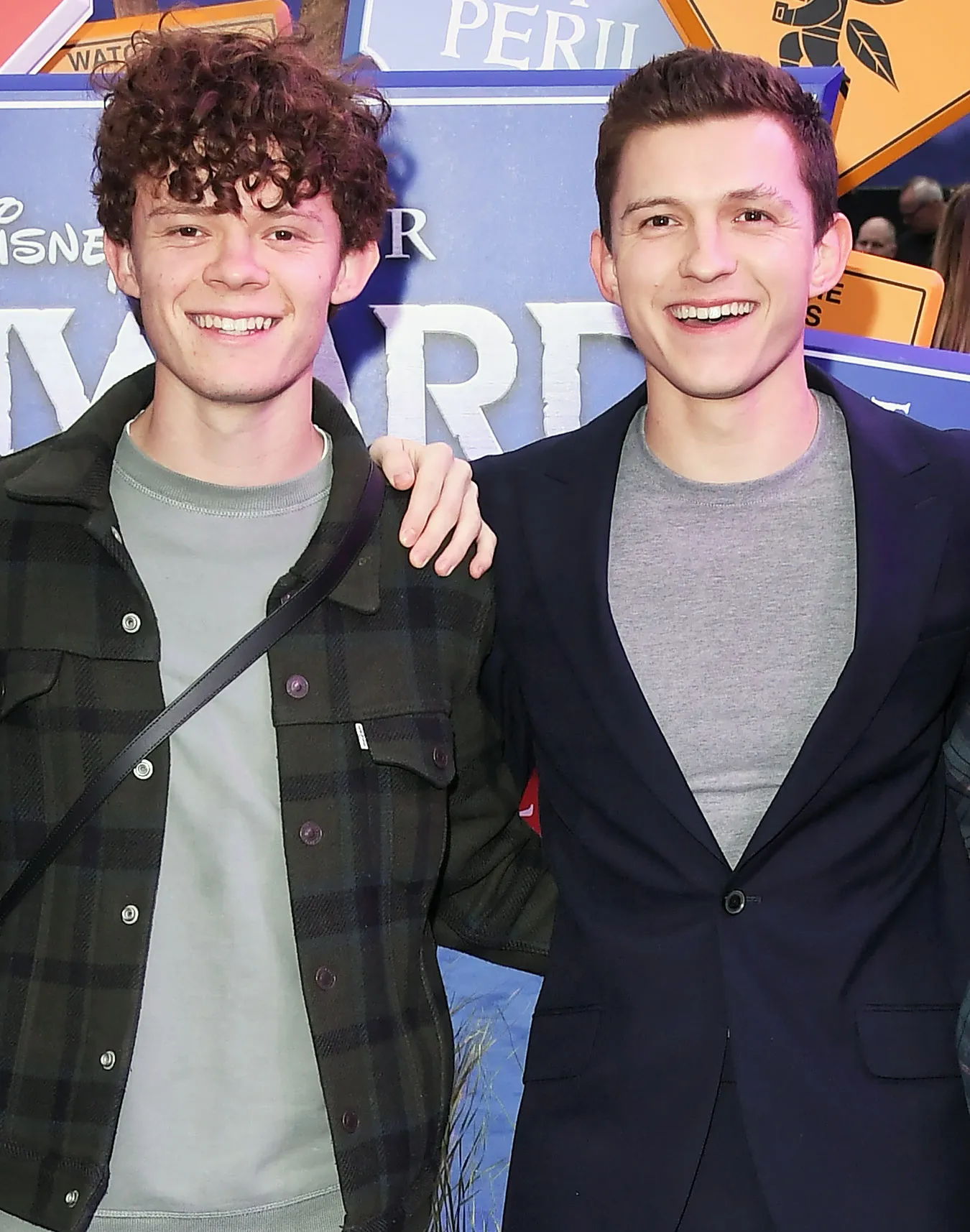 Tom Holland Gives Brother Harry a Salon-Quality Haircut at Replica Luxury Handbag
