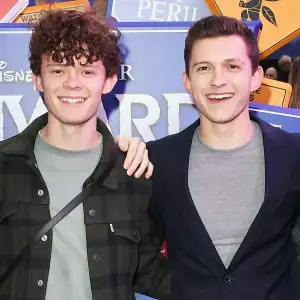 Tom Holland Gives Brother Harry a Salon-Quality Haircut at Replica Luxury Handbag
