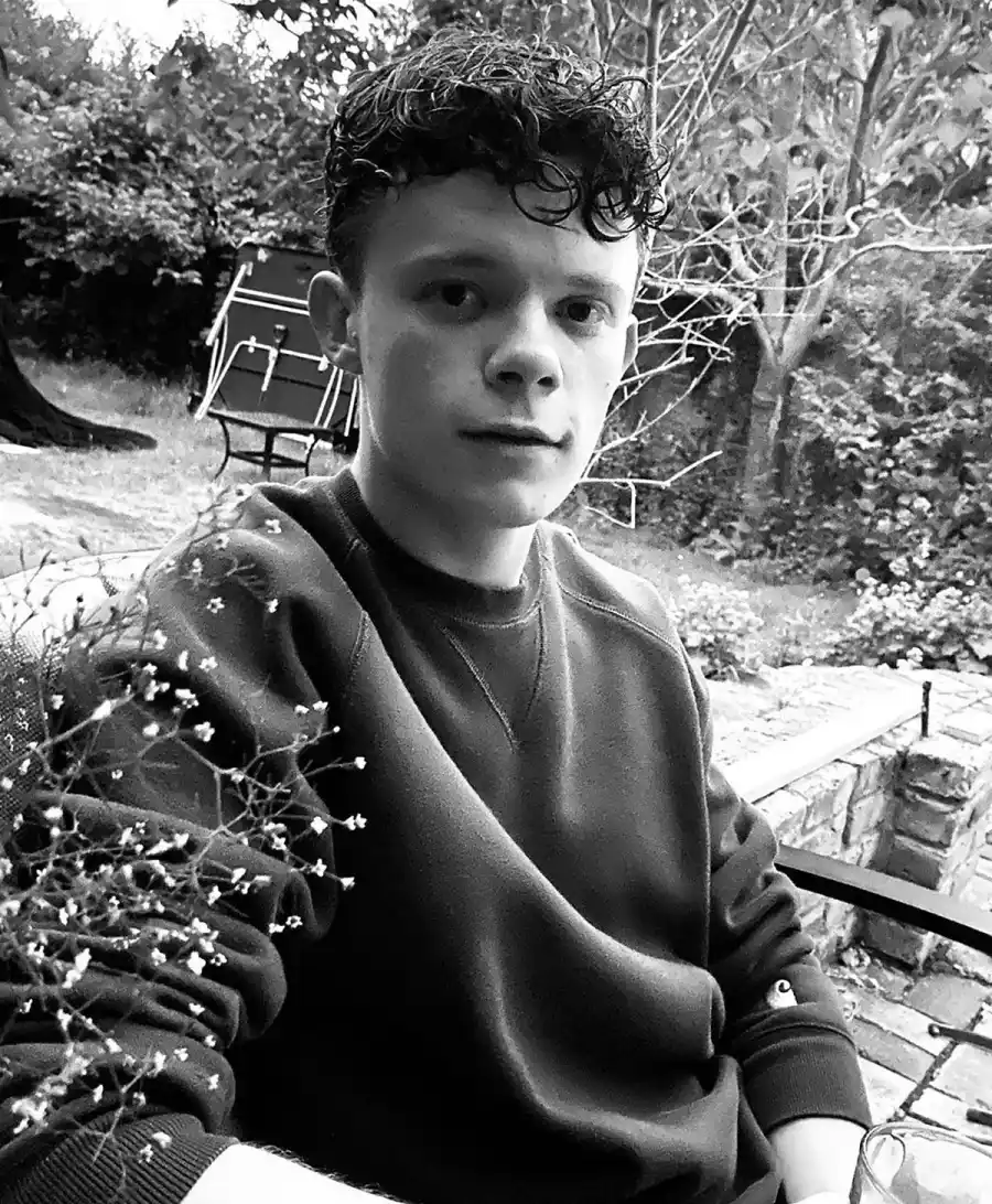 Tom Holland Gives Brother Harry a Salon-Quality Haircut at Replica Luxury Handbag