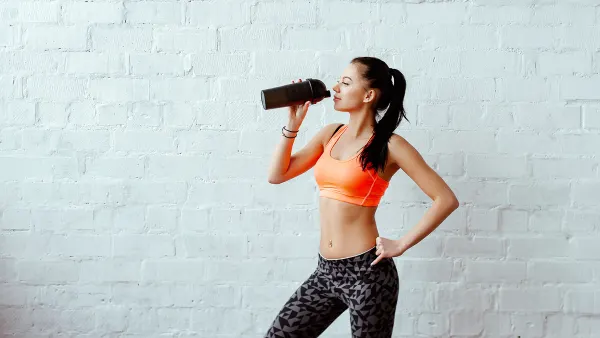 woman-drinking-healthy-shake-water